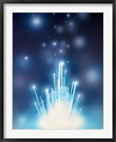 Framed Stars with trails rising from bright white burst of light toward deep blue