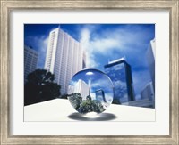 Framed Close up of clear globe with white sky line in center duplicated background