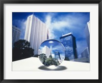 Framed Close up of clear globe with white sky line in center duplicated background