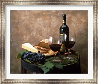 Framed Still life of wine bottle, wine glasses, cheese and purple grapes on top of barrel