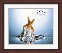 Framed Starfish rising on water bubble toward bright light