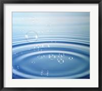 Framed Large rings in blue water with bubbles