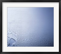 Framed Water drops on clear glass with purple background