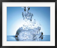 Framed Close up of explosive water bubbles in deep blue water