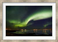 Framed Aurora Borealis in the sky, Alftanes, Reykjavik, Iceland