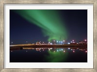 Framed Aurora Borealis over a town, Njardvik, Iceland