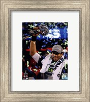 Framed Russell Wilson with the Vince Lombardi Trophy Super Bowl XLVIII