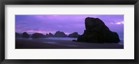 Framed Silhouette of rock formations in the sea against a pink sky, Myers Creek Beach, Oregon