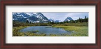 Framed Lake with mountains in the background, US Glacier National Park, Montana, USA