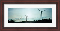 Framed Wind turbines in motion at dusk, Provence-Alpes-Cote d'Azur, France