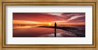 Framed Silhouette of human sculpture on the beach at sunset, Another Place, Crosby Beach, Merseyside, England