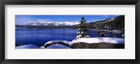Framed Lake with a snowcapped mountain range in the background, Sand Harbor, Lake Tahoe, California, USA