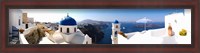 Framed Rooftop view of buildings at the waterfront, Santorini, Greece