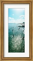 Framed Tourists enjoying on the beach at Coney Island, Brooklyn, New York City, New York State, USA
