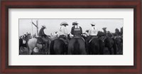 Framed Cowboys on horses at rodeo, Wichita Falls, Texas, USA