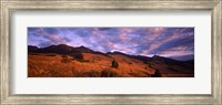 Framed Clouds over mountainous landscape at dusk, Montana, USA