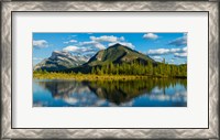 Framed Mount Rundle and Sulphur Mountain reflecting in Vermilion Lake in the Bow River valley at Banff National Park, Alberta, Canada