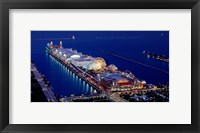 Framed Navy Pier lit up at dusk, Lake Michigan, Chicago, Cook County, Illinois, USA