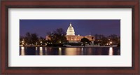 Framed Government building lit up at dusk, Capitol Building, National Mall, Washington DC, USA