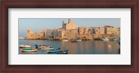 Framed Buildings at the waterfront with boats at harbor, Giovinazzo, Puglia, Italy