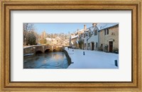 Framed Buildings along snow covered street, Castle Combe, Wiltshire, England