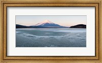 Framed Yamanaka Lake covered with ice and Mt Fuji in the background, Yamanakako, Yamanashi Prefecture, Japan