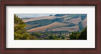 Framed High angle view of winding road in valley, Tuscany, Italy