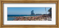 Framed Tourists on the beach with W Barcelona hotel in the background, Barceloneta Beach, Barcelona, Catalonia, Spain
