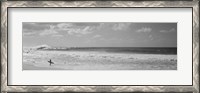 Framed Surfer standing on the beach in black and white, Oahu, Hawaii