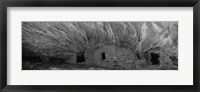 Framed Dwelling structures on a cliff in black and white, Anasazi Ruins, Mule Canyon, Utah, USA