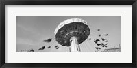 Framed Low angle view of people spinning on a carousel, Stuttgart, Baden-Wurttemberg, Germany