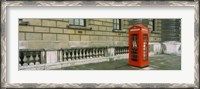 Framed Telephone booth at the roadside, London, England