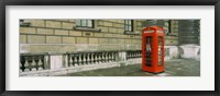 Framed Telephone booth at the roadside, London, England