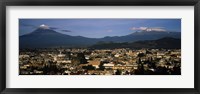 Framed Aerial view of a city a with mountain range in the background, Popocatepetl Volcano, Cholula, Puebla State, Mexico