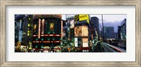 Framed Buildings in a city lit up at night, Shinjuku Ward, Tokyo Prefecture, Kanto Region, Japan