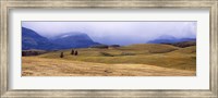 Framed Rolling landscape with mountains in the background, East Glacier Park, Glacier County, Montana, USA