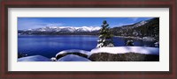 Framed Lake with a snowcapped mountain range in the background, Sand Harbor, Lake Tahoe, California, USA