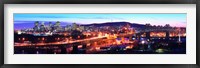 Framed Jacques Cartier Bridge with city lit up at dusk, Montreal, Quebec, Canada 2012