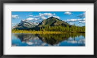 Framed Mount Rundle and Sulphur Mountain reflecting in Vermilion Lake in the Bow River valley at Banff National Park, Alberta, Canada