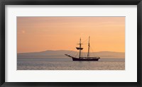 Framed Tall ship in the Baie De Douarnenez at sunrise, Finistere, Brittany, France