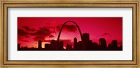 Framed Gateway Arch with city skyline at sunset, St. Louis, Missouri