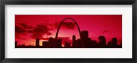 Framed Gateway Arch with city skyline at sunset, St. Louis, Missouri