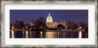 Framed Government building lit up at dusk, Capitol Building, National Mall, Washington DC, USA