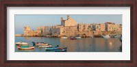 Framed Buildings at the waterfront with boats at harbor, Giovinazzo, Puglia, Italy