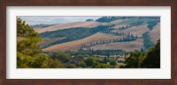 Framed High angle view of winding road in valley, Tuscany, Italy