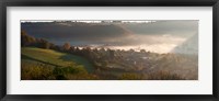 Framed Misty morning valley with village, Uley, Gloucestershire, England