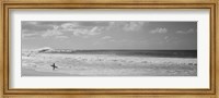 Framed Surfer standing on the beach in black and white, Oahu, Hawaii