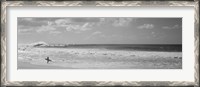 Framed Surfer standing on the beach in black and white, Oahu, Hawaii