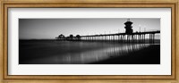 Framed Pier in the sea, Huntington Beach Pier, Huntington Beach, Orange County, California (black and white)