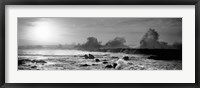 Framed Waves breaking on rocks in the ocean in black and white, Oahu, Hawaii